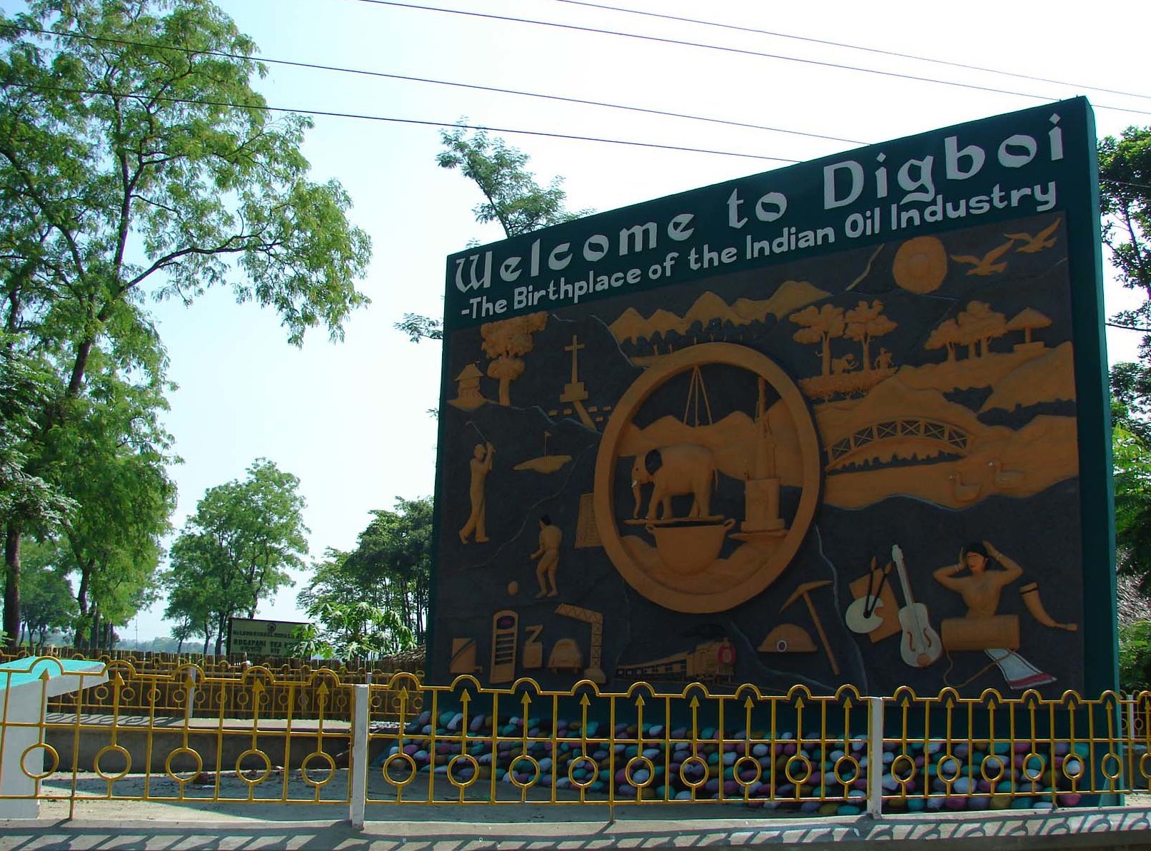 A sign post showing Welcome to Digboi