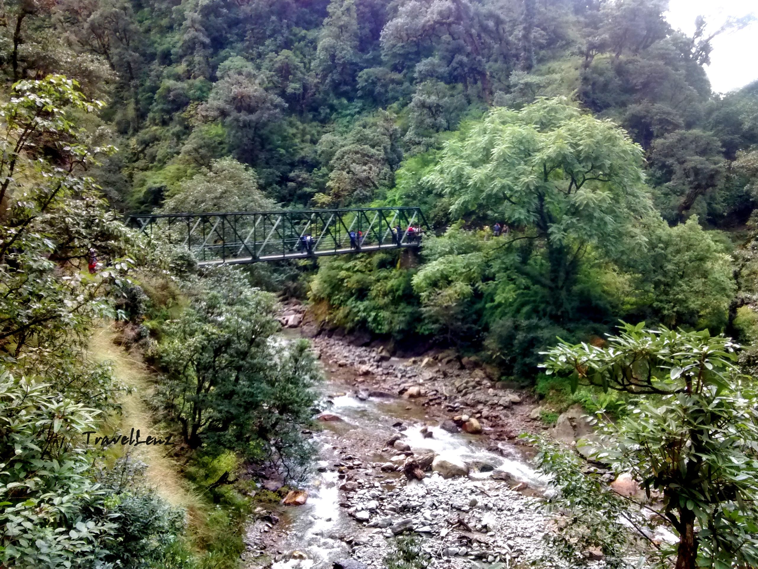 The Raun Bagad metal bridge across a small brook