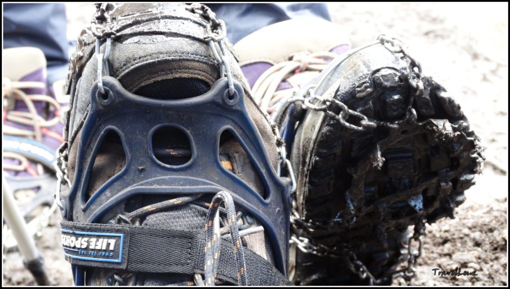 Crampons attached to trekking shoes