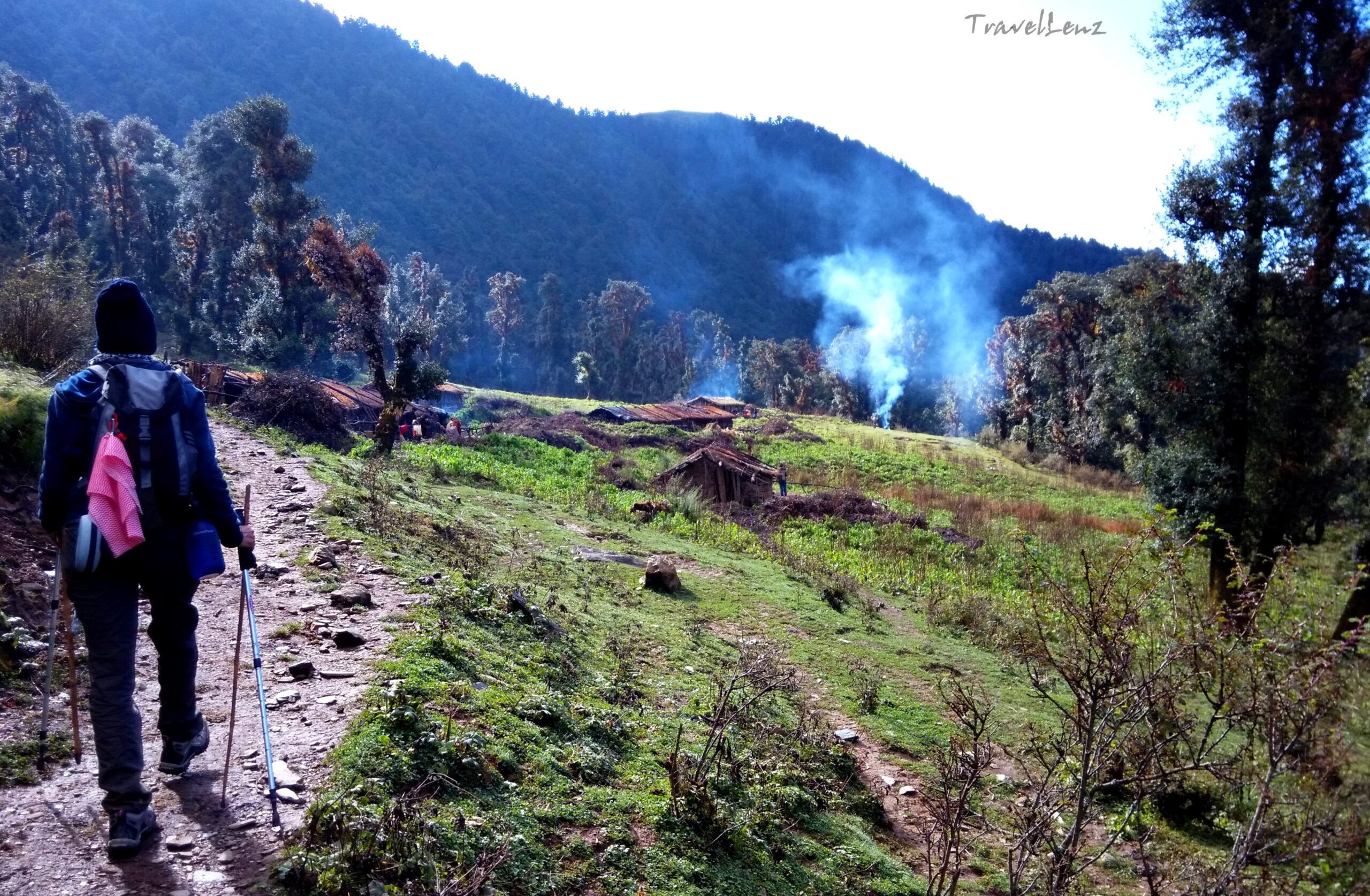 Trekker walking into Tol Pani village