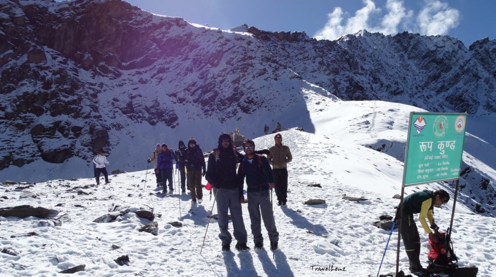 Geodetic marker that reads Roopkund Lake 0 km