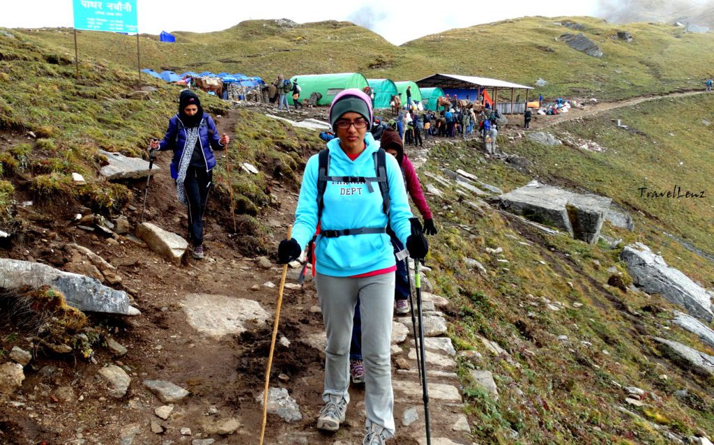 Trekkers hiking from Pathar Nachauni to Lohajung