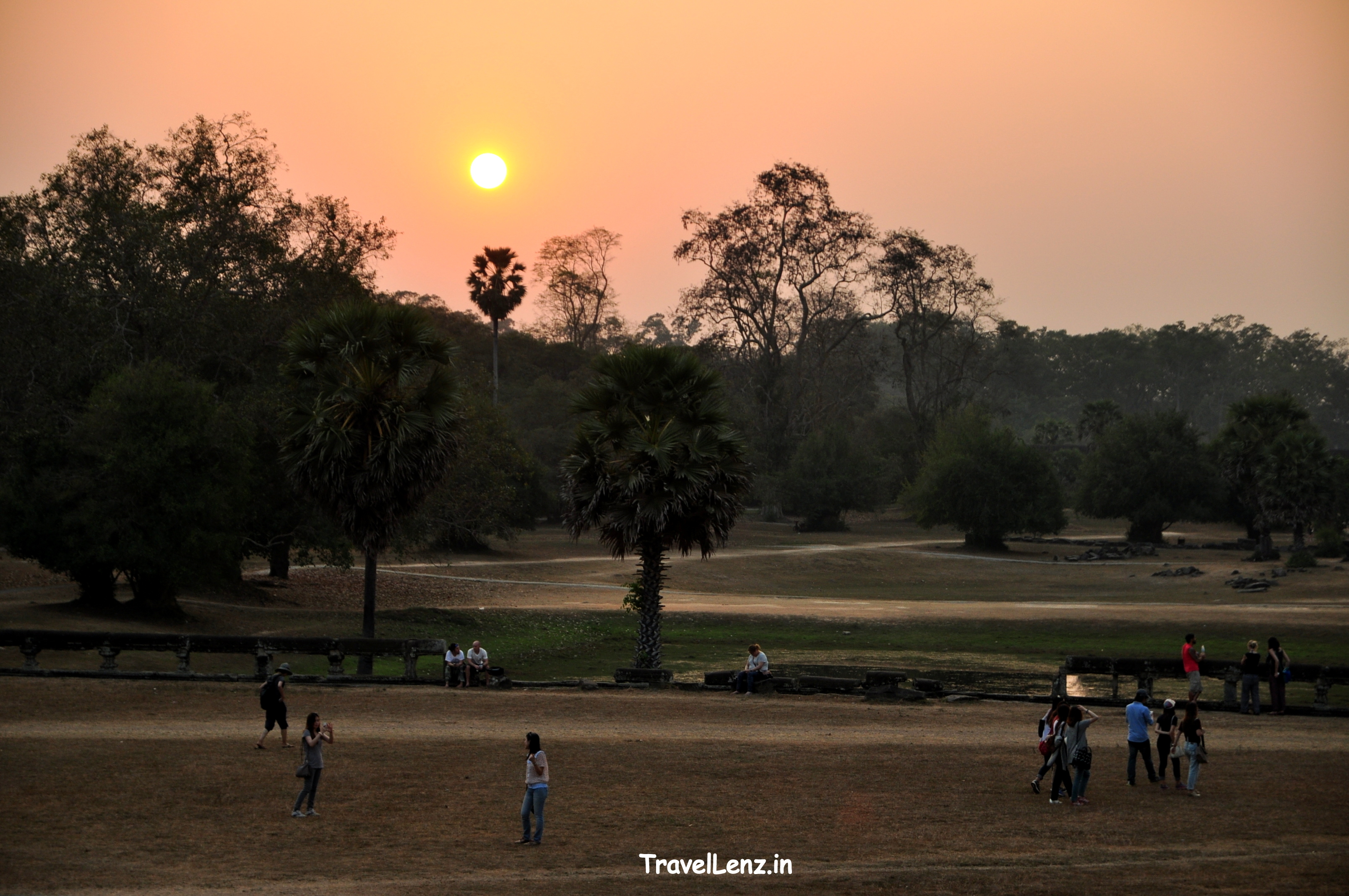 The sun sets as Angkor Wat