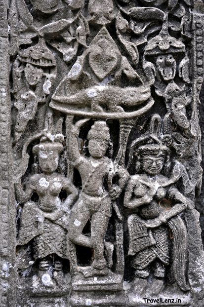 Lord Krishna lifting Mt Govardhana