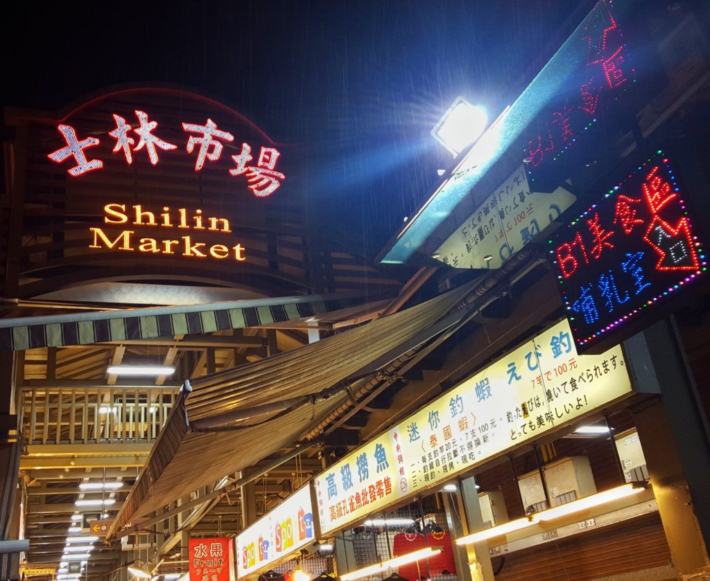 Market place with signboard and shops