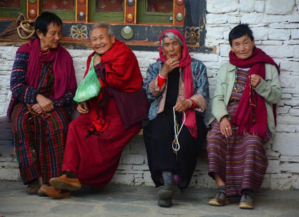 A group of women sitting together and chatting